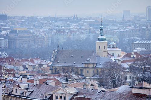 View of Prague in the winter. Prague, Czech Republic old streets in the snow. View of the historical part of Prague