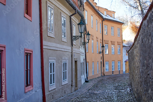 Fototapeta Naklejka Na Ścianę i Meble -  View of Prague in the winter. Prague, Czech Republic old streets in the snow. View of the historical part of Prague