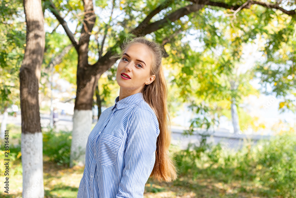 Autumn woman portrait outdoors at the park Autumn woman portrait outdoors at the park