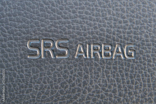 SRS Airbag warning text on passanger side dasboard of a car. photo