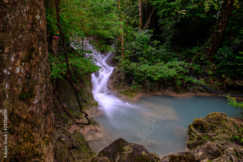 emerald waterfall in the forest in Kanchanaburi Thailand