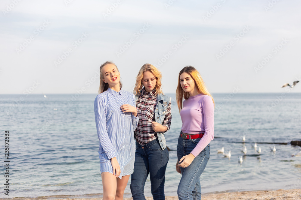 A picture of a group of women having fun on the beach