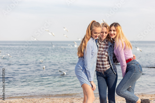 A picture of a group of women having fun on the beach