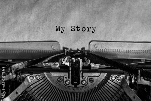 word my story printed on a vintage typewriter. journalism, writing.