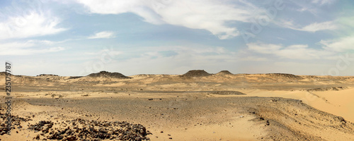 Libyan desert with cloudy blue sky in Egypt
