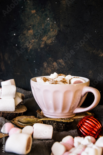 Good New Year spirit. Coffee with marshmallows and cinnamon. Pink mug. Cooking yourself. Photos for coffee. Home comfort. New Year. Christmas time. Winter mood.