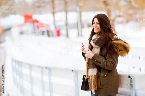 Woman drinking tea or coffe...