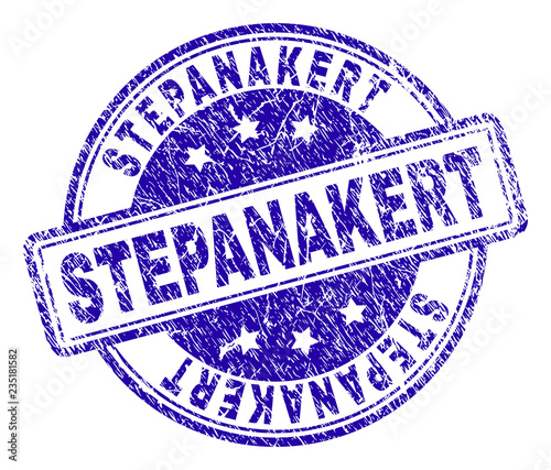 STEPANAKERT stamp seal watermark with grunge texture. Designed with rounded rectangles and circles. Blue vector rubber print of STEPANAKERT caption with dust texture. photo