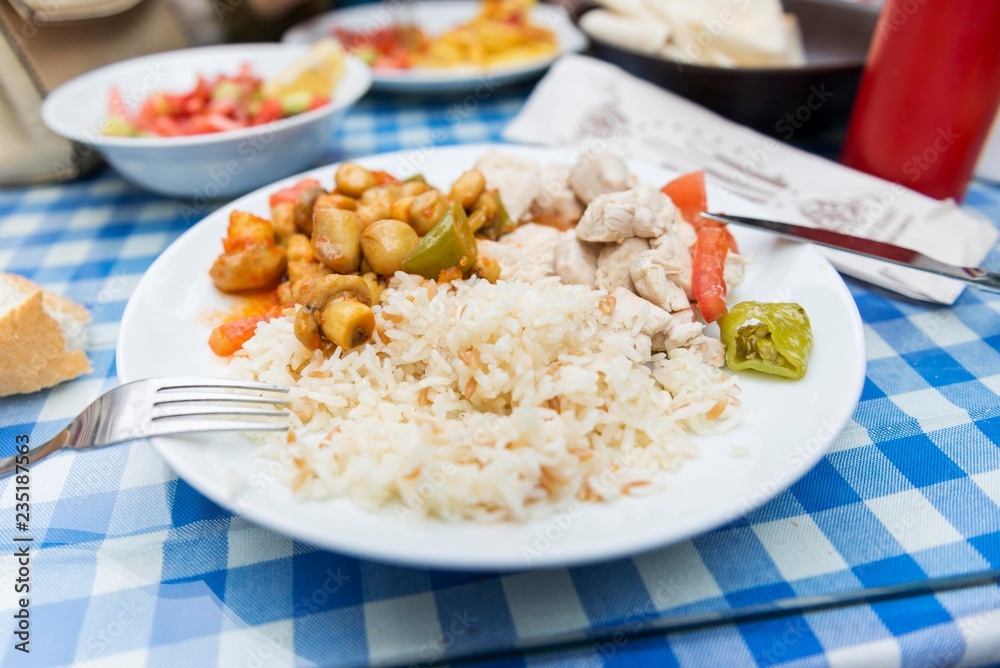 rice with chicken meat and mushrooms