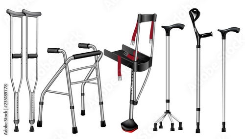 Set of orthopedic walking sticks on white background