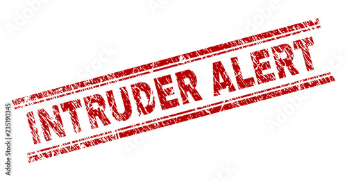 INTRUDER ALERT seal print with corroded texture. Red vector rubber print of INTRUDER ALERT text with grunge texture. Text label is placed between double parallel lines.