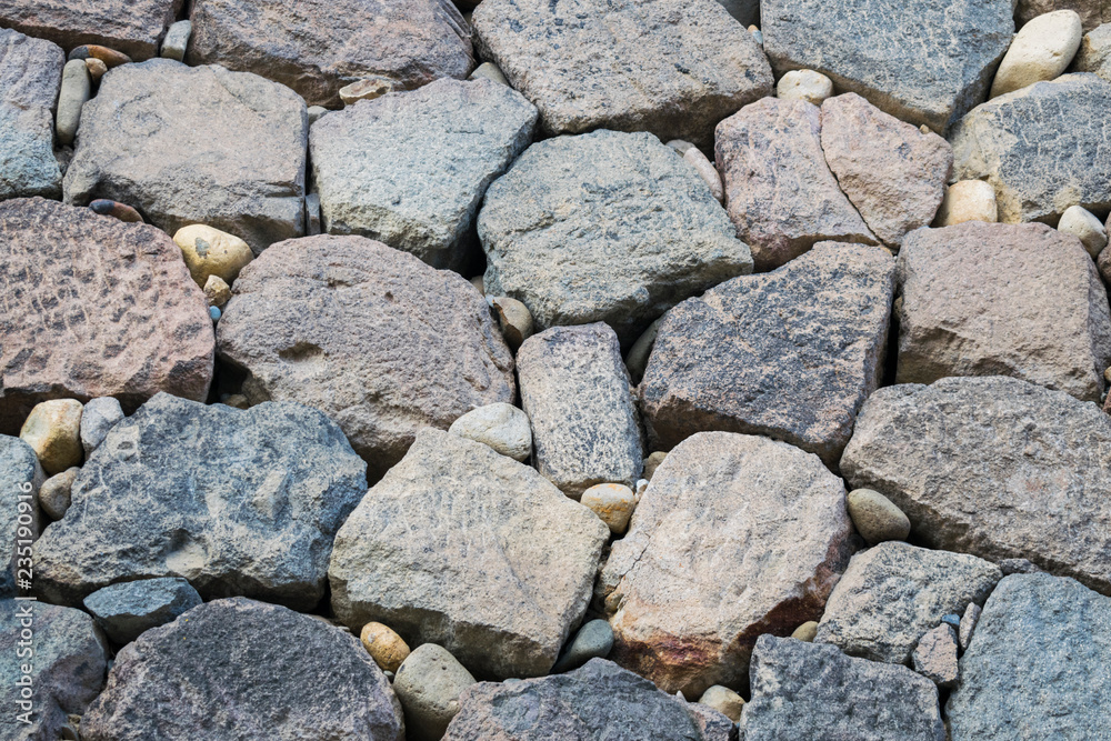 Background with detail of stone wall texture in traditional Japanese park near Kanazawa castle, Japan. Background with detail of stone wall texture in traditional Japanese park near Kanazawa castle, Japan.
