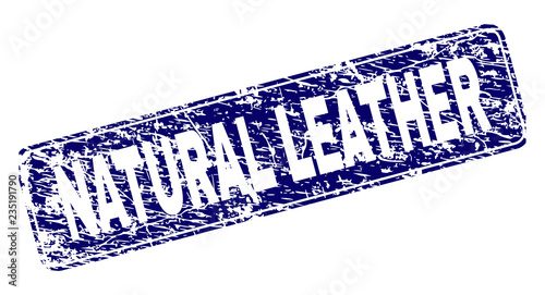 NATURAL LEATHER stamp seal print with distress texture. Seal shape is a rounded rectangle with frame. Blue vector rubber print of NATURAL LEATHER title with corroded texture.