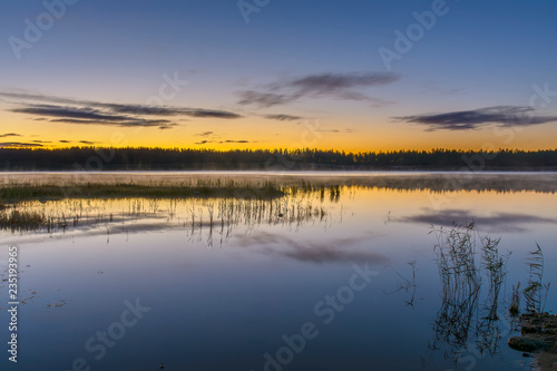 Early morning on the lake in the Leningrad region. © zoya54