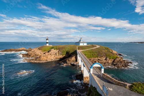 Pancha island lighthouse in Ribadeo coastline, Galicia, Spain. photo