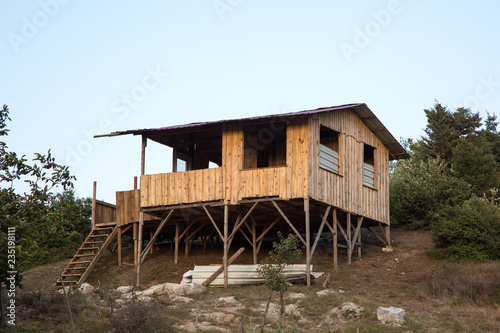  wooden house in countryside © Pelin