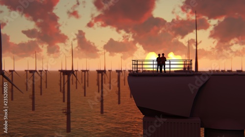 Two offshore workers on the top of the windmill, wind farm