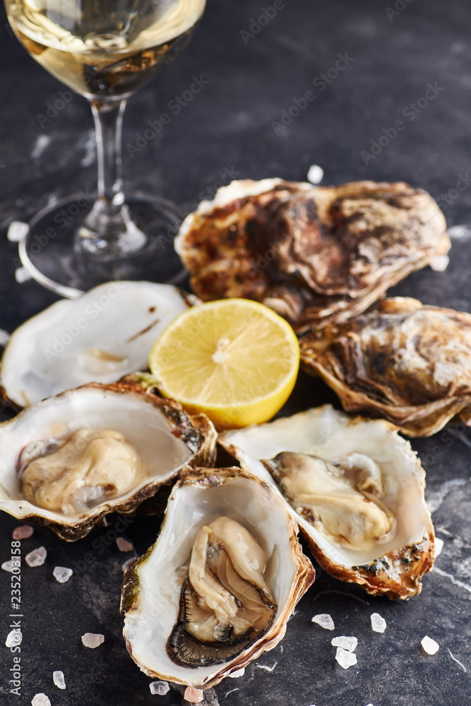 Oyster served with lemon and salt