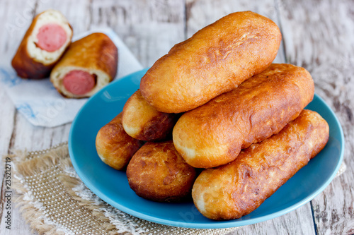 Sausage in dough, fried patties from choux pastry stuffed with sausage