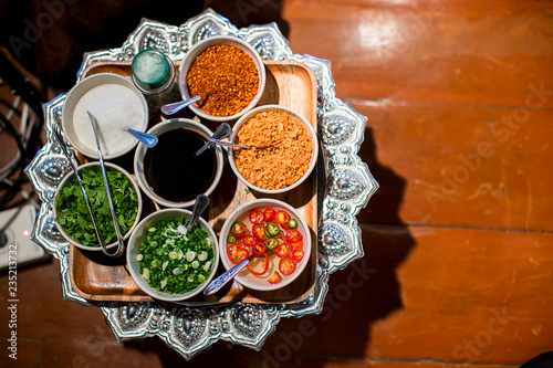 spices with ingredients on dark background. asian food, healthy or cooking concept. Thai's food. Ingredients of Thai spicy food, tom yum.Selection of spices herbs and ingredients for cooking.