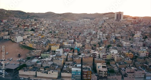 Aerial view of slum buildings in city with sunset time