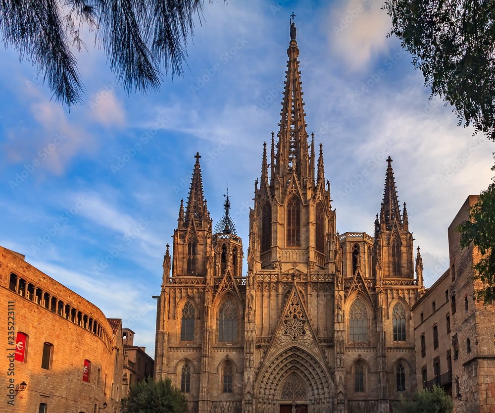 View of the gothic Cathedral of the Holy Cross and Saint Eulalia, or Barcelona Cathedral, seat of the Archbishop of Barcelona, Spain at sunset View of the gothic Cathedral of the Holy Cross and Saint Eulalia, or Barcelona Cathedral, seat of the Archbishop of Barcelona, Spain at sunset