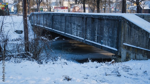 Frozen bridge with snow
