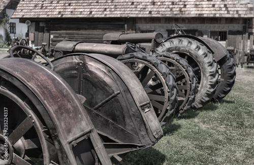 Old unused tractors in Cernat village, Transylvania, Romania. Old machines, old utensils. Hdr image photo