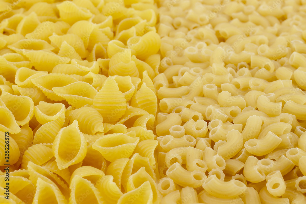 Two kinds of pasta. The foreground in focus, back is not present. Two kinds of pasta. The foreground in focus, back is not present.
