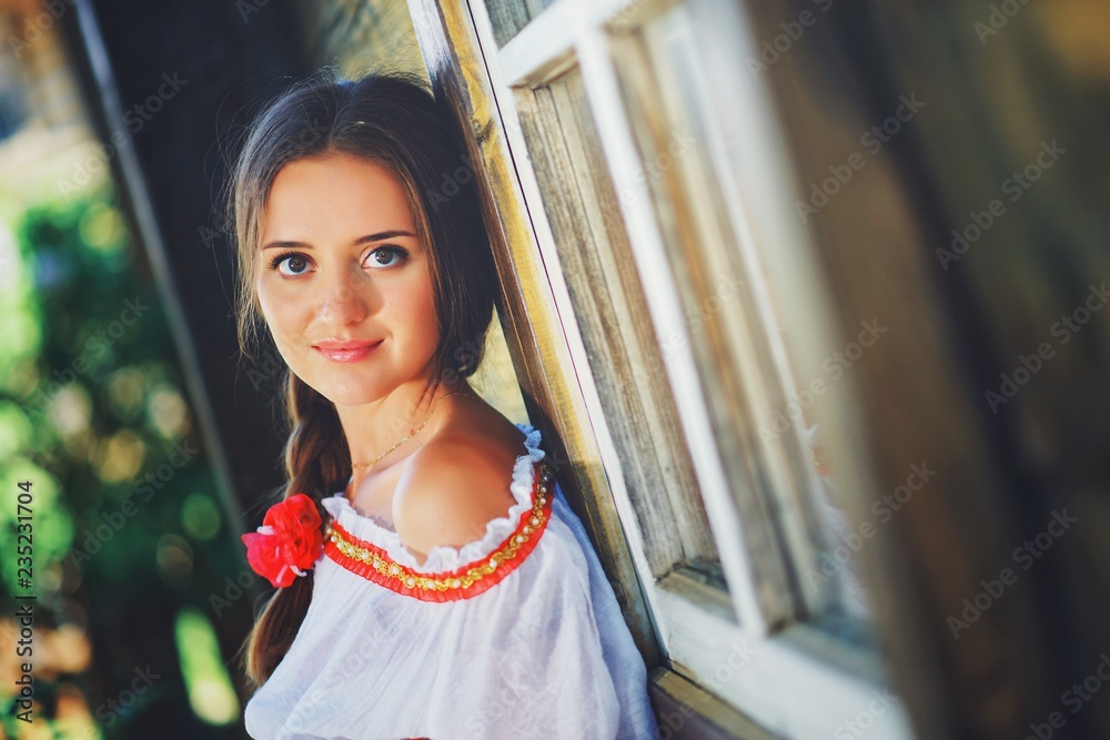 Beautiful young Russian girl in national costume Stock Photo