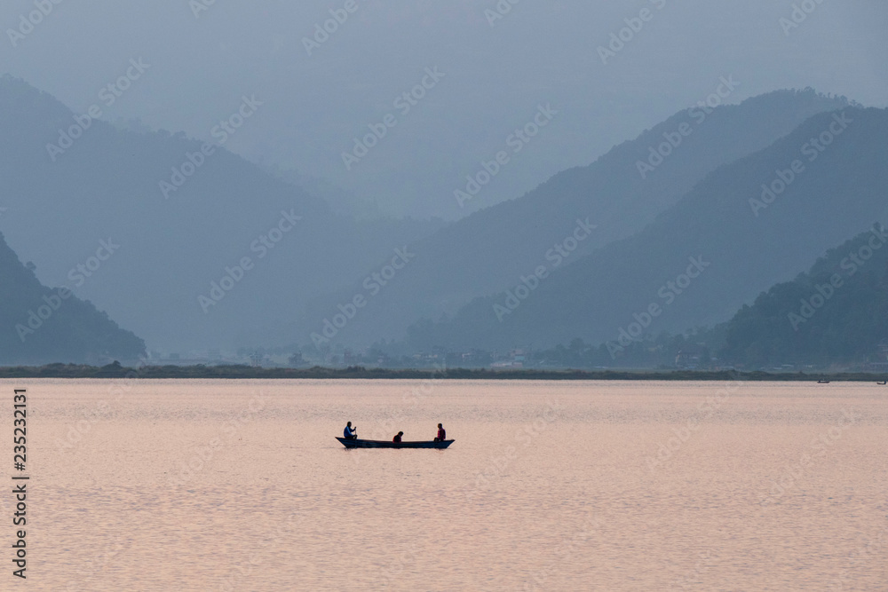 The tourist enjoying on paddle boat in Phewa lake