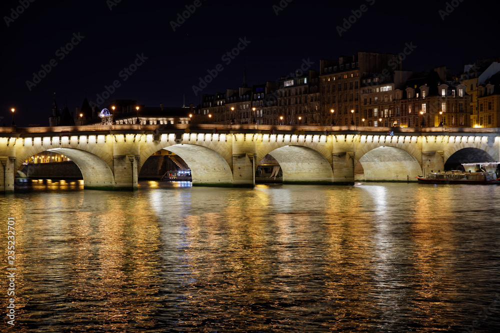 Paris, France - November 18, 2018: Pont Neuf bridge by night in Paris
