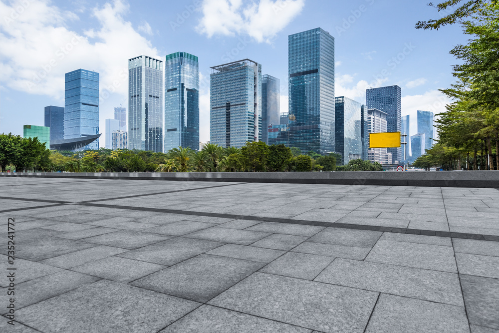 Panoramic skyline and buildings with empty square floor.