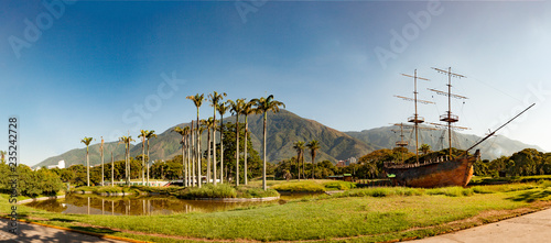 View of the  iconic  Caracas mountain el Avila or Waraira Repano and an old ship Lander from the East Park or Parque del Este. photo