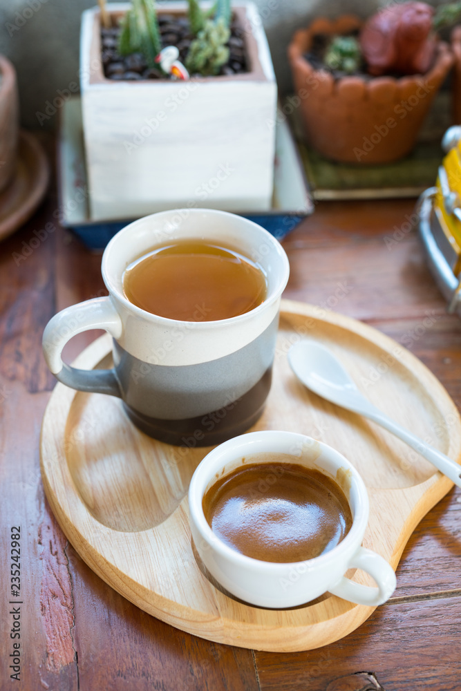 Hot espresso coffee and tea on wood table Hot espresso coffee and tea on wood table