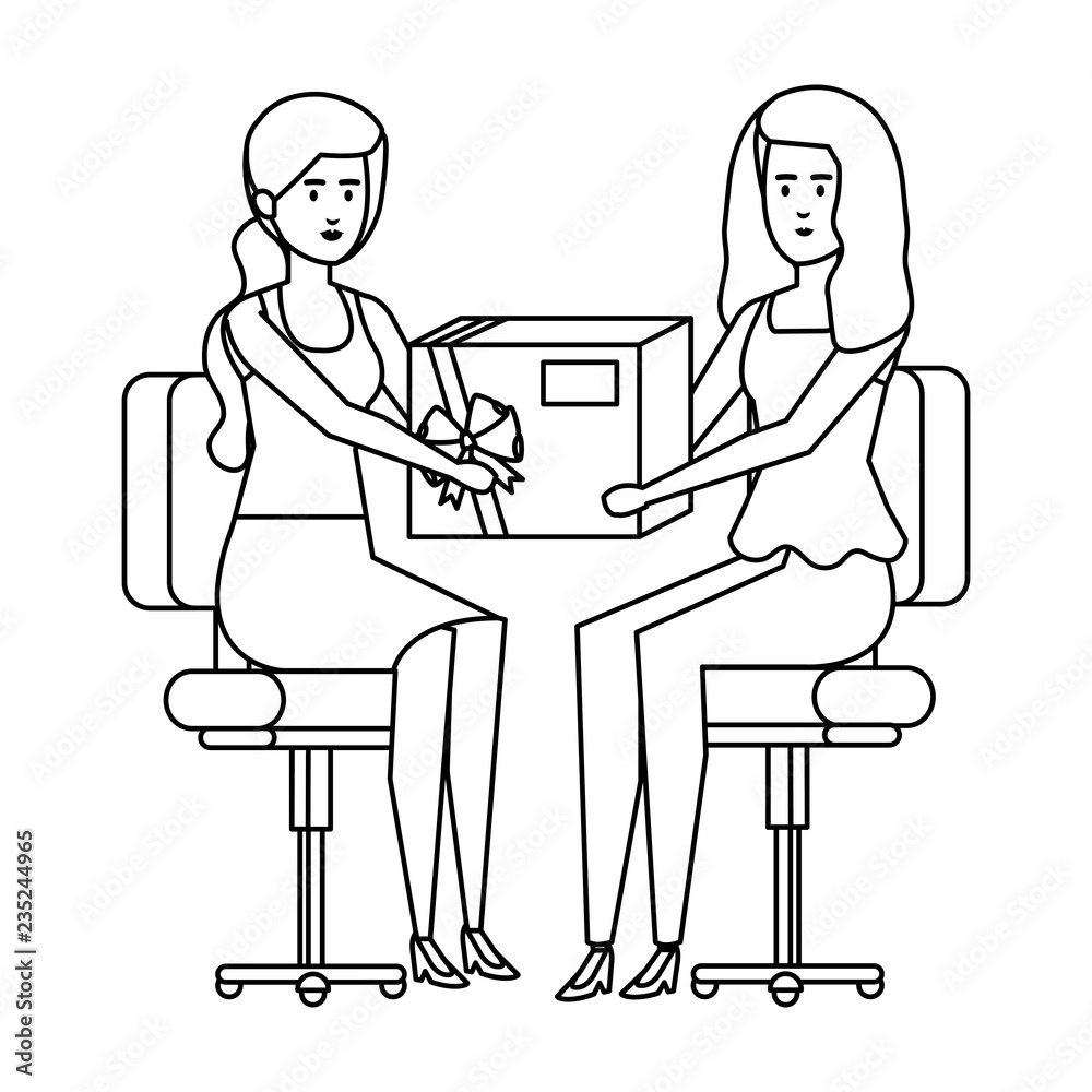 businesswomen sitting in office chair giving gift businesswomen sitting in office chair giving gift