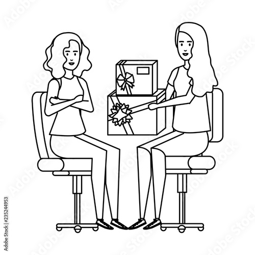 businesswomen sitting in office chair giving gift