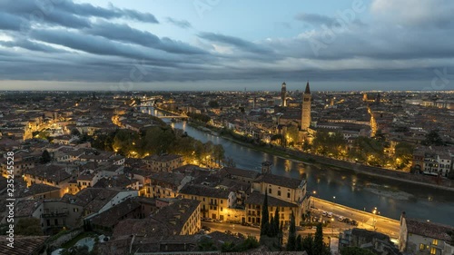 Verona skyline aerial view from night to day timelapse video Italy. photo