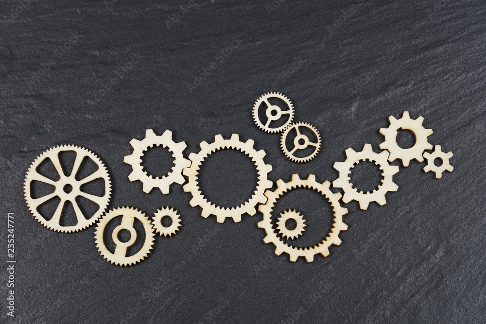 Gears on black background. Conceptual image of industry, mecanics, connection or team work.
