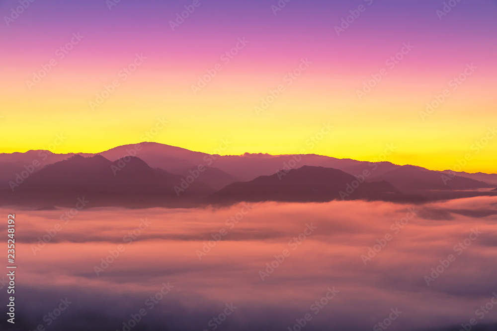 Landscape view of sunrise with white fog  in early morning on the top of the hill at yun lai viewpoint, pai, Mae Hong Son, thailand