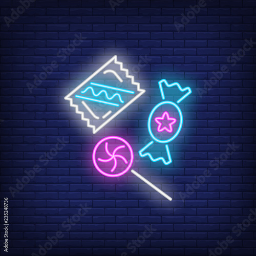 Candies neon sign. Invitation, dessert or advertisement design. Night bright neon sign, colorful billboard, light banner. Vector illustration in neon style.