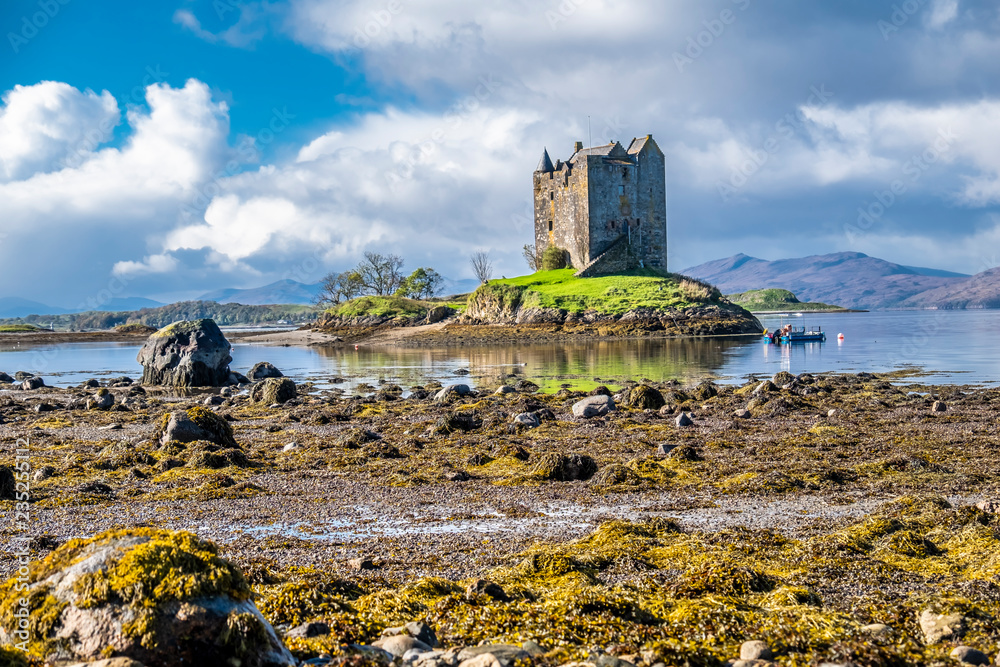 View of the Castle Stalker in autumn on the low tide near Port Appin, Argyll - Scotland
