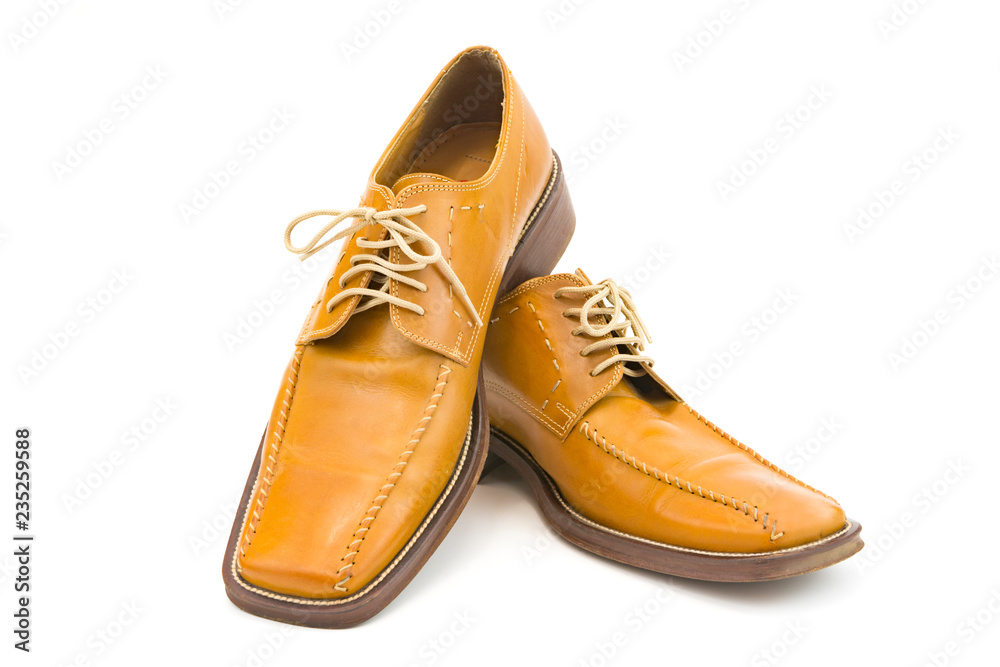 Men's autumn shoes made of genuine brown leather with laces on an isolated background. Classic shoes 