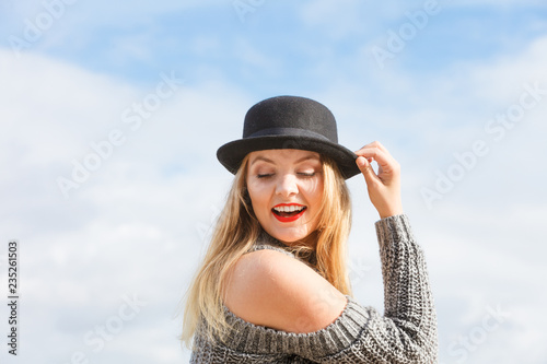Woman wearing fedora and jumper outdoor © anetlanda