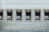 Modern street ATMs for withdrawal of money and other financial transactions.
