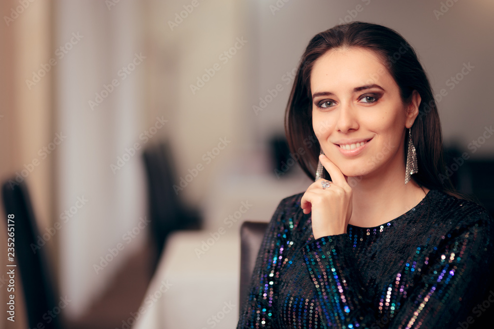 Portrait of a Glamorous Woman Sitting at a Party Portrait of a Glamorous Woman Sitting at a Party