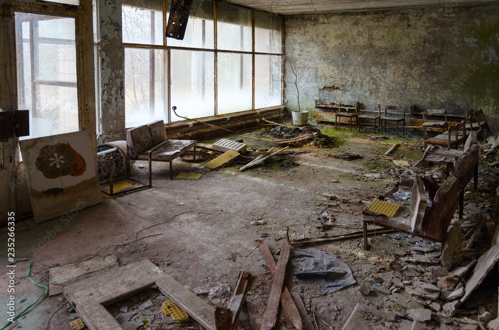 Hall in hospital No. 126, dead ghost town of Pripyat in alienation zone of Chernobyl NPP, Ukraine