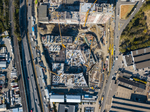 Aerial top view of construction site with cranes © ucarer