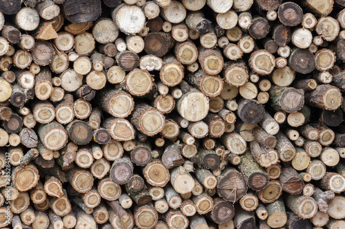 Stack of firewood as background texture
