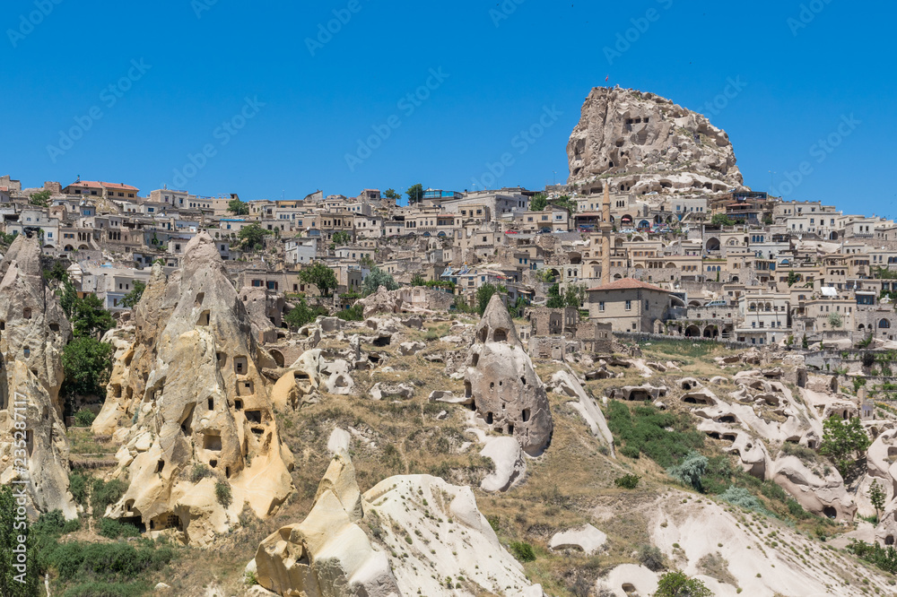 Uçhisar, Turkey - A Unesco World Heritage site, Cappadocia is famous for its fairy chimneys, churches and castles carved in the rock, and a unique heritage